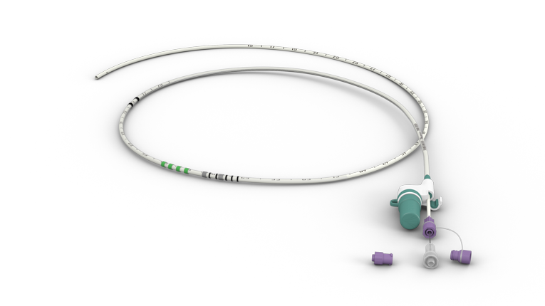 A long, narrow, flexible tube with several markings for length. On 1 end of the tube, there is a connecter with a green cap. There is also a feeding tube attachment with purple caps.